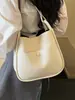 Bolso cruzado casual de diseño de nicho de moda transfronterizo, patrón simple de lichi, bolso de alta gama para madre e hija para ir al trabajo, bolso cruzado versátil