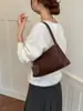Bolso tejido con patrón transfronterizo para mujer, nuevo bolso tipo cubo de gran capacidad, bolso de hombro versátil y moderno para llevar debajo del brazo