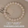 Pulsera de Perlas Blancas Lechosas Redondas Shijia Luz Fuerte Pulsera Elástica para Mujeres Pulsera Apilable No Irrita la Piel y No se Descolora Accesorios para la Mano
