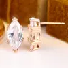 Pendientes de botón de circonita con corte ojo exclusivos transfronterizos Rongxing Pendientes de botón dorados con bisel de encaje vintage Pendientes de botón de moda