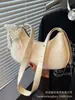 Bolso de Mujer de Gama Alta de Nicho Primavera/Verano 2026 Nuevo Vintage Versátil Bolso de Hombro Cruzado Bolso de Axila de Trabajo Bolso Dumpling