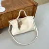 Bolso de mano casual de gran capacidad para mujer, nuevo modelo 2026, bolso de hombro simple para el día a día, bolso cruzado casual estilo coreano