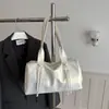 Bolsa Transfronteiriça Grande Capacidade Primavera 2026 Nova Estilosa Nicho Retrô Moda Simples Versátil Ombro Único Portátil Bolsa Almofada