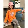 Camiseta de manga comprida para meninas 2026 primavera e outono nova estilosa camiseta básica de primavera infantil para crianças mais velhas, top de algodão puro com desenho
