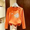 Camiseta infantil casual de algodão puro, gola redonda, manga longa, novo estilo fino para primavera e outono de 2026, top versátil com desenho para crianças maiores