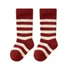 Calcetines para bebé otoño nuevo lazo de encaje rojo calcetines de princesa niñas niños medianos y grandes infantil rojo brillante calcetines de Año Nuevo