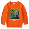 2026 Versão Coreana Primavera e Outono Camiseta de Algodão Infantil Gola Redonda Manga Longa Camiseta Básica para Meninos e Meninas Camiseta de Bebê