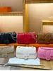 Bolsas Textura Fashionável Bolsa de Axila Feminina Tendência 2025 Nova Bolsa de Ombro com Corrente Europeia e Americana Luxo Acessível Versátil Bolsa Transversal
