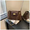 Bolsa Feminina 2024 Outono/Inverno Novo Estilo Moda Casual Acolchoada com Diamantes Bordado Bolsa de Corrente Bolsa de Ombro Único Feminina Bolsa Transversal