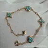 V oro versión alta L familia burro rombo pulsera redonda cuatro flores nácar blanco nácar rosa fábrica de origen transmisión en vivo llevar mercancía