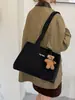Bolso tote estilo coreano ins bolso simple de gran capacidad para mujer otoño 2026 bolso de mano versátil de lona de un solo hombro