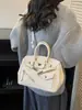 Bolsa de Platina Texturizada de Alta Qualidade para Mulheres, Novo Estilo Transfronteiriço, Bolsa de Mão de Grande Capacidade, Bolsa Kelly Retro Fashion para Ombro e Transversal