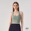Sujetador deportivo cruzado al cuello con espalda abierta y diseño retorcido para mujer, top tipo tank top abierto en la espalda para yoga con almohadillas en el pecho, ropa deportiva para correr y fitness para mujer