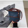 Bolsa de Mano de Mezclilla Simple Casual de Venta Caliente Otoño 2026 Bolso Cubo de Gran Capacidad Bolso Cruzado de Hombro Único Bolsa de Lona