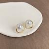 Pendientes de perlas ovaladas estilo palacio vintage para mujer, aretes franceses de cuentas de concha de alta gama, elegantes y nichos.