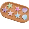 Tamaño pequeño Transparente Brillo Estrella de Mar Concha Resina Accesorios DIY Pasador de Pelo Hebilla de Zapato Accesorios DIY Bolso Sombrero Accesorios