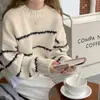 Suéter Listrado Solto Feminino Outono e Inverno Explosões Estilo Preguiçoso Manga Longa Feminino Top de Tricô