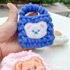 Bolsa de almacenamiento para auriculares Bluetooth, funda protectora de peluche con forma de oso, tejida a mano, con el mismo estilo de pintura para escuchar.