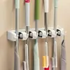 Soporte de pared para mopa, clip sin agujeros, gancho para escoba y mopa, artefacto multifuncional para almacenamiento en pared de balcón y baño