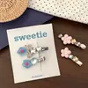 Pinza para el pelo con letra de flor de pedrería de alta gama, elegante, estilo coreano dulce y femenino, lujo ligero con un toque sofisticado, exquisita pinza de pico de pato