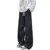 Colección nueva de primavera y otoño transfronteriza: pantalones largos de moda para hombres jóvenes, con un diseño holgado y estiloso, versátiles y casuales