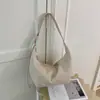 Moda transfronteiriça elegante bolsa feminina de alta qualidade 2026 outono casual bolsa de ombro para trabalho e deslocamento bolsa bolinho
