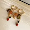 Pendientes de borla con carcasa de madera marrón transfronterizos europeos y americanos, pendientes de estilo vintage Maillard, pendientes de mujer de lujo ligero de alta gama