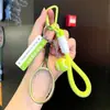 Nueva Serie Creativa de Raquetas de Tenis Colgante Llavero Cuerda Trenzada de Dopamina Encanto para Bolso Venta al por Mayor