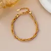 Pulsera Francesa Retro Oro y Plata Dos Tonos Cadena Retorcida de Hierba Tang Lujo Ligero Nicho Simple de Gama Alta Dulce y Fresca