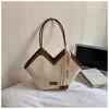 Bolso de hombro texturizado versátil casual vintage para el uso diario y salidas, nuevo bolso de mano para la axila de moda para mujer