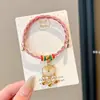 Pulseira de corda colorida zongzi do Festival do Barco-Dragão 2026 novo modelo pulseira trançada artesanal étnica infantil atacado corda vermelha