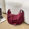 Bolsa transversal popular de tecido Oxford para mulheres deste ano, nova bolsa casual de ombro único para estudantes, aula, trajeto, bolsa bolinho 2026