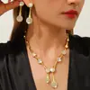 Conjunto de dos piezas de collar y pendientes con colgante de gota de agua full-diamond plateado, accesorio de vestido de noche de lujo ligero, disponible para envío transfronterizo