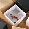 Caja de regalo con tapa de papel kraft personalizada Caja de regalo cuadrada cartón simple retro caja de embalaje universal al por mayor