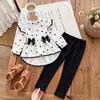2026 ropa para niños transfronteriza otoño nueva moda vestido de camisa larga con lazo y conjunto de leggings para niñas