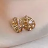 Brincos Europeus e Americanos Transfronteiriços em Forma de U Vazados Cravejados com Diamantes, Brincos de Moda Versáteis Exquisitos Retrô, Brincos de Luxo Leve de Alta Qualidade para Mulheres