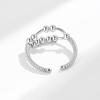 Anillo giratorio de estilo transfronterizo, simple, retro, de dos capas, con nicho cruzado, transferencia inteligente de cuentas, anillo de apertura con descompresión.