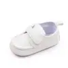 Zapatos casuales para bebé hombres y mujeres superficie de cuero PU artificial para bebé cierre de velcro color sólido suela suave zapatos para niños pequeños BNB3115