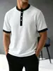 Camisa henley de punto gofre retro europea y americana para hombre de Amazon, con ribete de color contrastante, cuello redondo abotonado, transpirable, camiseta de manga corta con hombros caídos