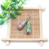 Venta al por mayor de fábrica aretes largos de cristal natural forma de gota de agua amatista Ojo de Tigre Joyería con gancho para la oreja aretes redondos de gota de agua DIY