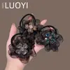 2025 Nuevo Estilo Coreano Lujo Ligero Diamante Brillante Flor de Cuatro Hojas Malla para el Cabello para Mujeres, Accesorio para el Cabello Simple de Moda y Versátil