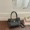 Bolso sencillo de dos piezas para mujer, moda de tendencia nueva primavera 2026, bandolera popular de nicho de un solo hombro