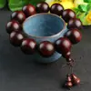 Venta al por mayor de fábrica Pulsera de Palisandro de hoja pequeña de Zambia Pulsera de cuentas de madera de sándalo rojo africano para hombre y mujer entrega en una sola pieza suministro