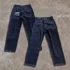 Amazon Y2K Primavera Estilo Casual Simples Jeans com Bolso Estampa de Letras Abstratas Calças de Rua Estilo Europeu e Americano