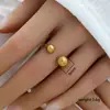 Anillo de acero de titanio ajustable con explosiones transfronterizas al por mayor anillo retro de acero inoxidable con presión de aceite apertura anillo de pareja para hombres y mujeres
