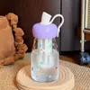 Taza de agua muy atractiva con forma de manzana, taza creativa de vidrio de borosilicato resistente a altas temperaturas, portátil y a prueba de fugas, adecuada para preparar té, un regalo para niñas