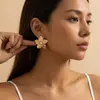 Pendientes de acero inoxidable chapados en oro de moda transfronteriza con acabado brillante, estilo vacacional de verano en la playa del océano, tachuelas de estrella de mar y concha