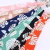 Tela de camisa estampada de hojas de bala de cuatro lados 100d venta al por mayor tela para pantalones de playa tela para ropa con estampado de coco tropical