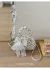 Bolsa elegante de bolinhas para mulheres, nova moda de verão casual de nicho, bolsa pequena quadrada de ombro único e transversal