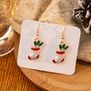 Pendientes de copo de nieve de Papá Noel transfronterizos europeos y americanos de Navidad Pendientes de alce con campana de caramelo Pendientes de gorro navideño